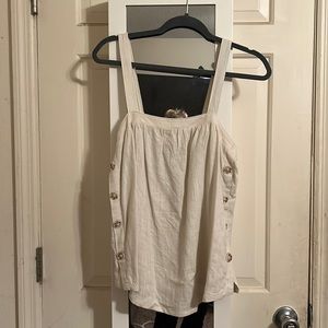 Linen/Rayon tank. Button down sides w adjustable straps.